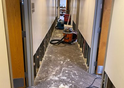 restoring lower walls in hallway at Saint Stephens Church in Omaha, NE